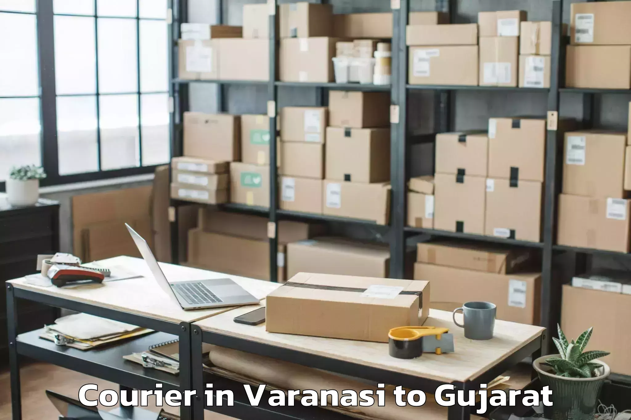 Reliable Varanasi to Waghai Courier